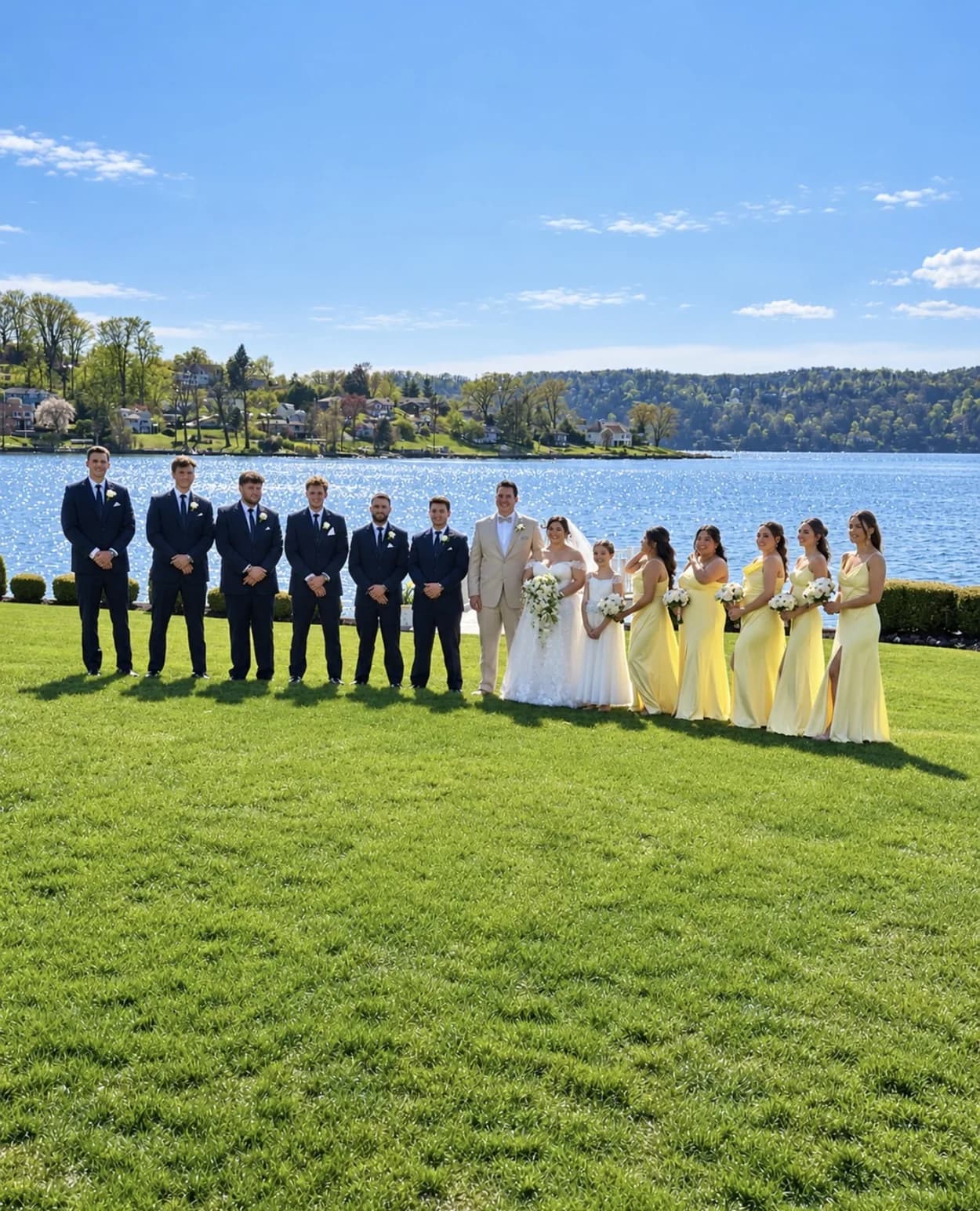 Anna and Robert with their wedding party overlooking Candlewood Lake at The Candlewood Inn in Brookfield, CT