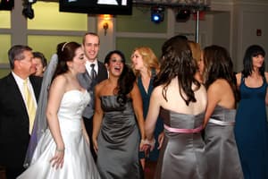 Bride and wedding party celebrating together