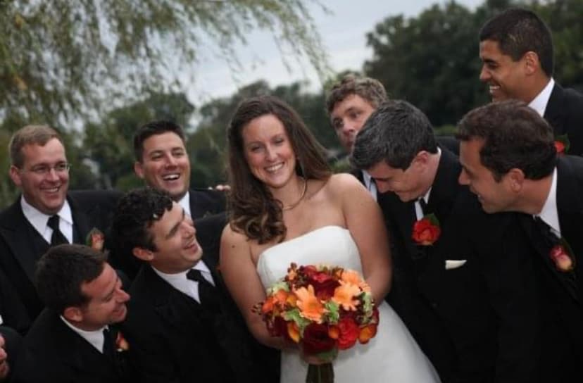 Bride celebrating with her wedding party